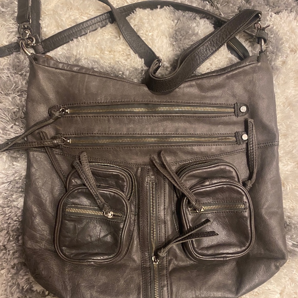 Excellent cond .. tano gray leather bag